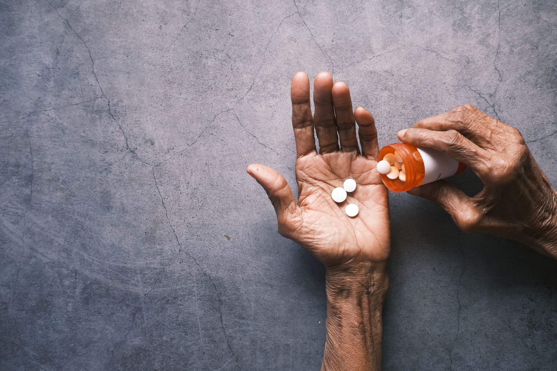 Hands of an older adult — autoimmune conditions are treated with Plaquenil.