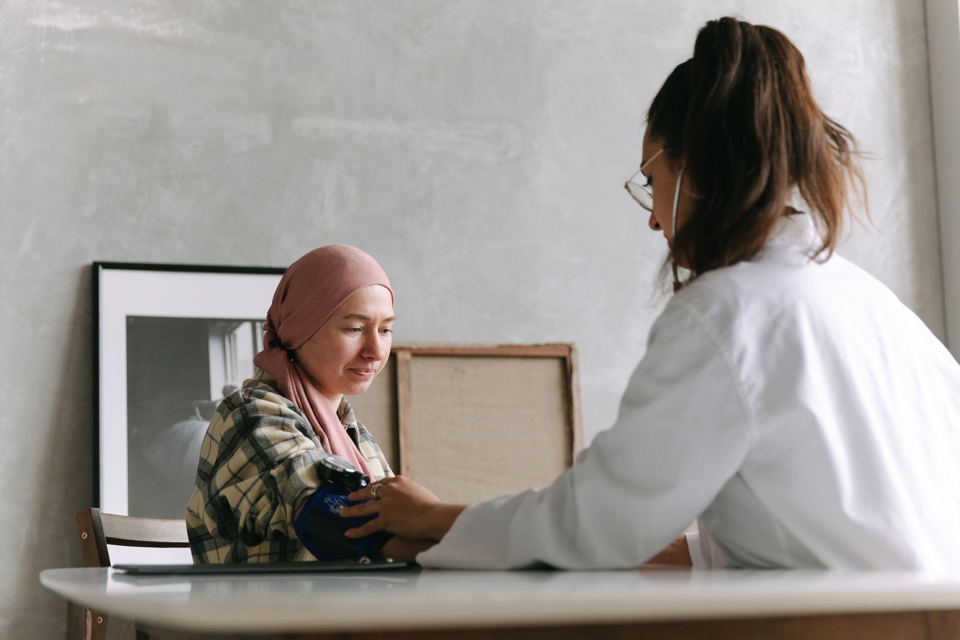 A clinician with a patient during a routine primary care visit.